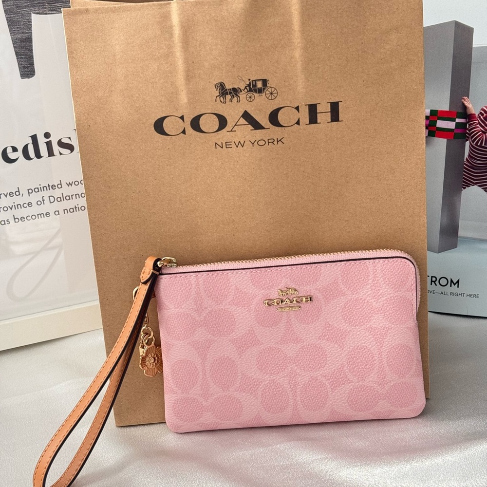 Coach Corner Zip Wristlet In Signature Canvas With Charms CEF72